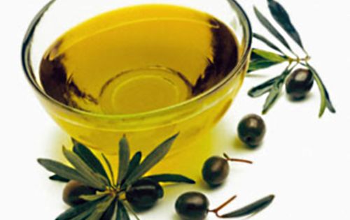 Bowl of Olive Oil --- Image by © J.Garcia/photocuisine/Corbis